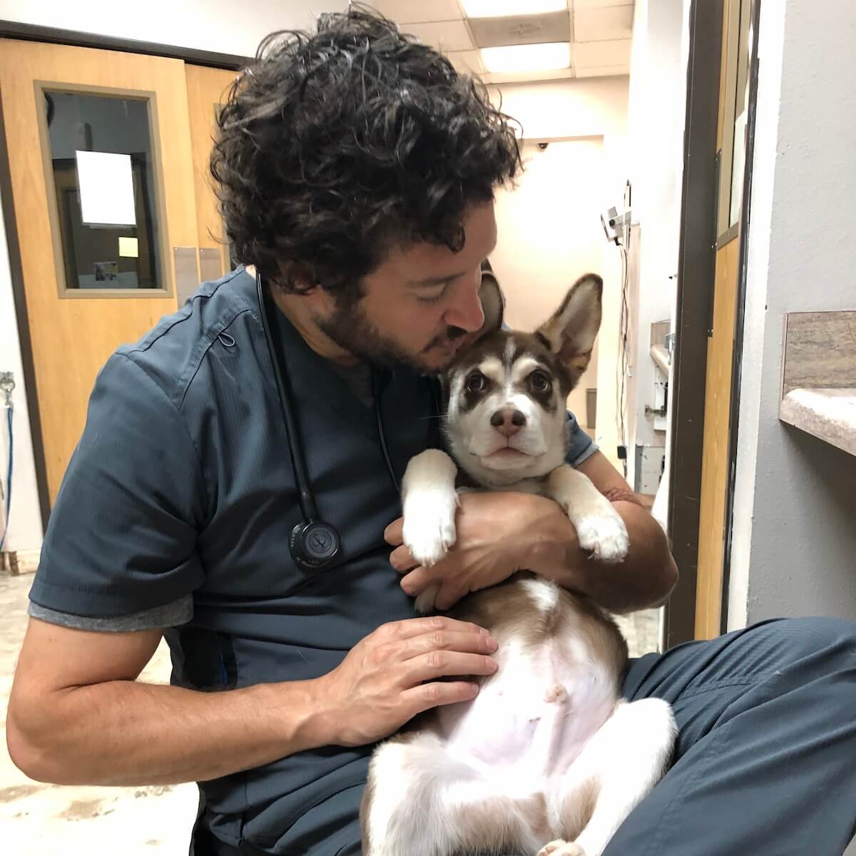Dr. Davis with dog in lap